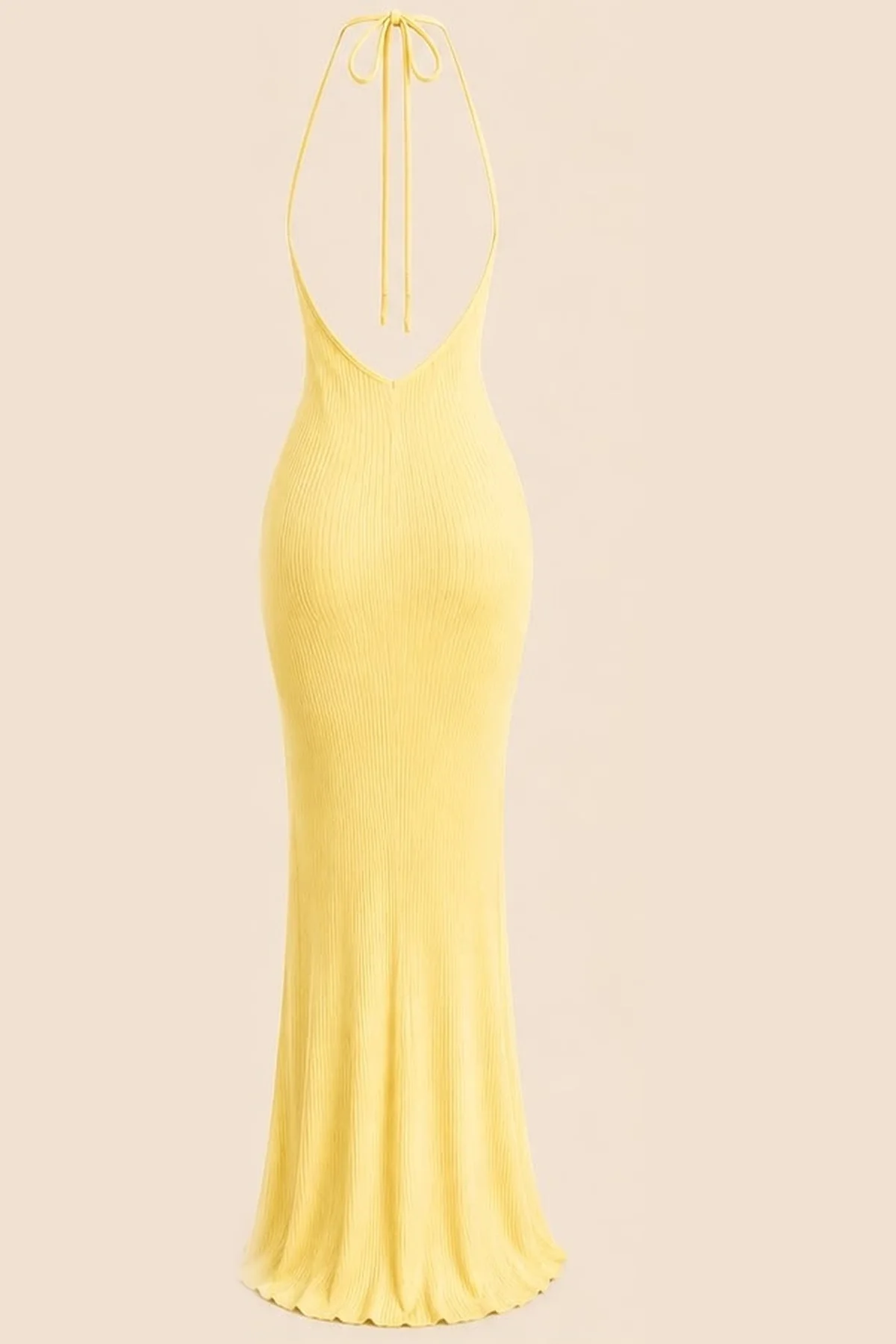 Luna Dress in Butter Yellow, back view showing the tie neck and open back